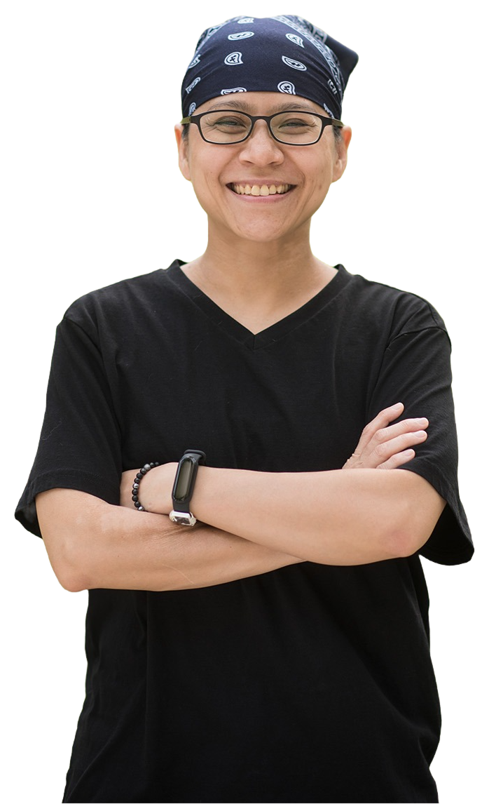 Amrys Wang smiling with arms folded